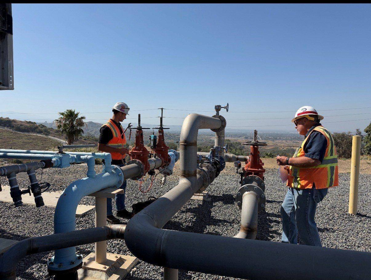CES staff at a landfill gas header