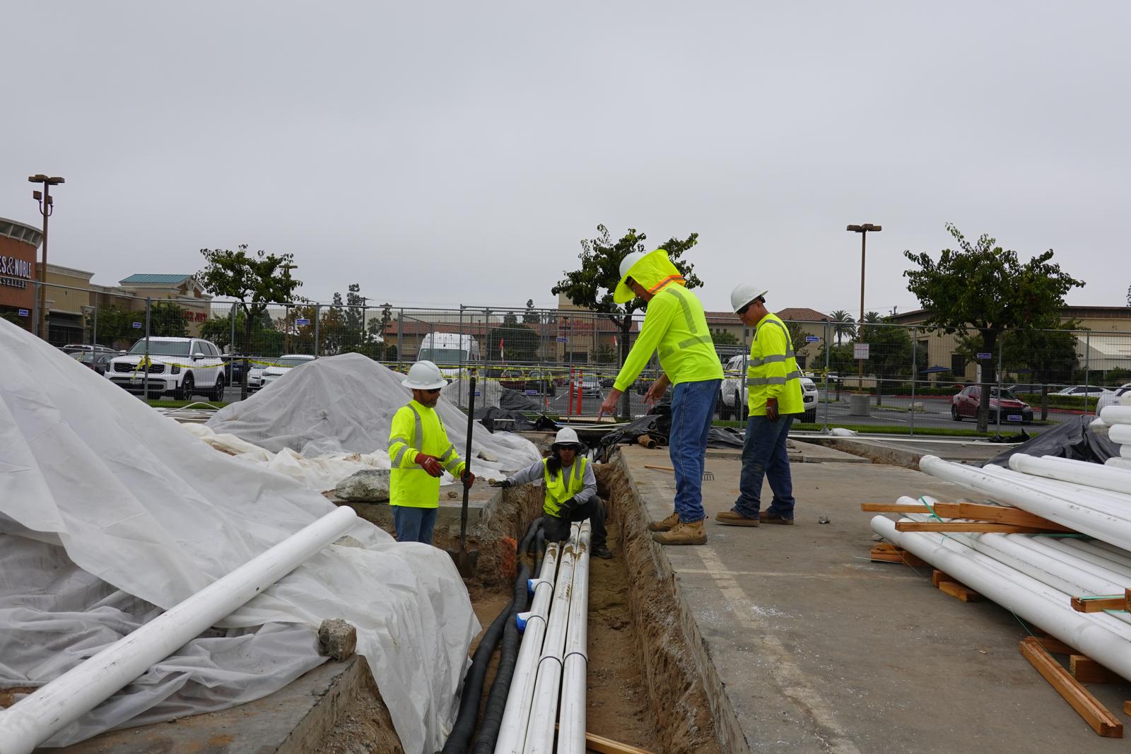 CES crew installing remediation conveyance piping